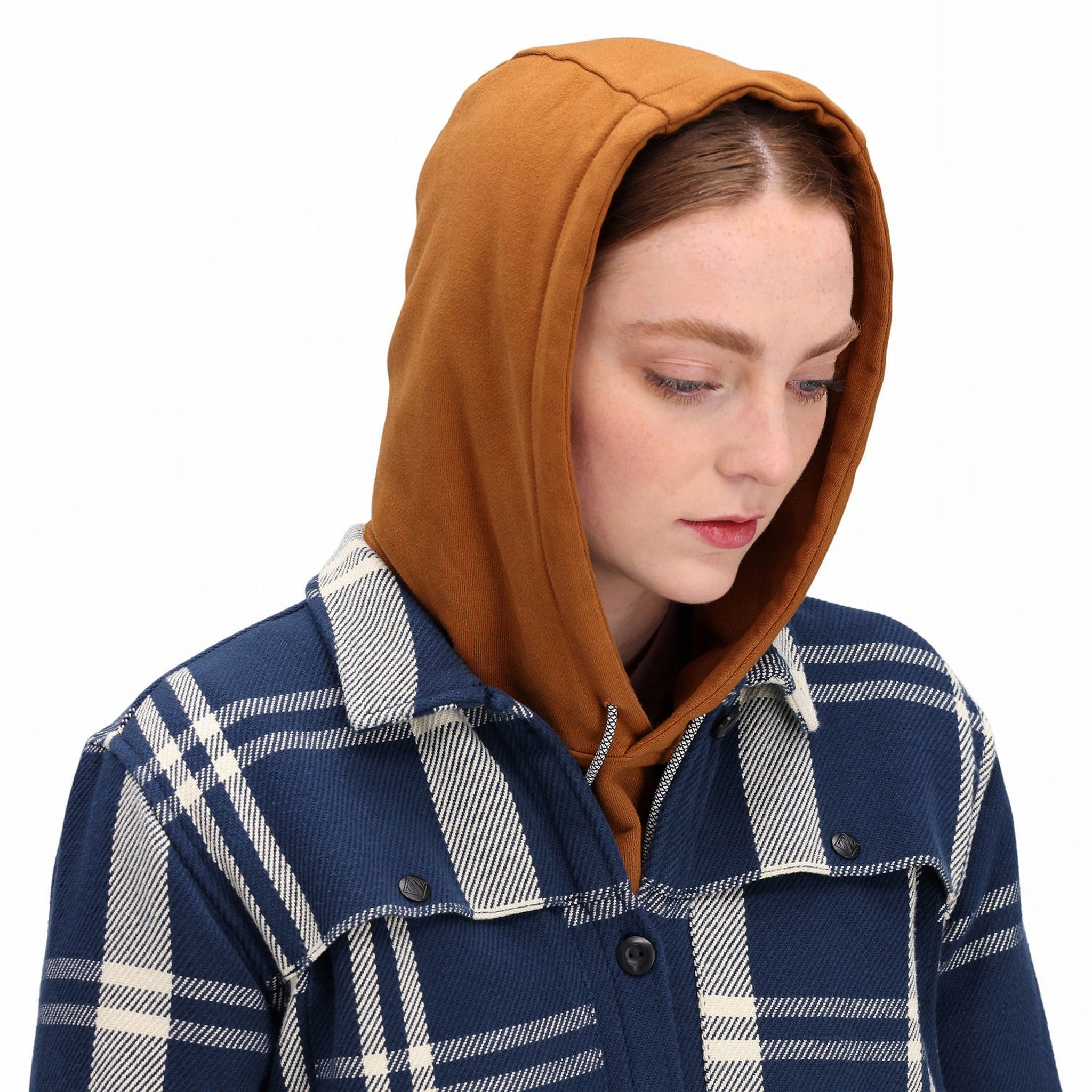 Detail model shot of Topo Designs Women's Mountain Shirt Jacket in "navy / white plaid" showing collar and buttons.