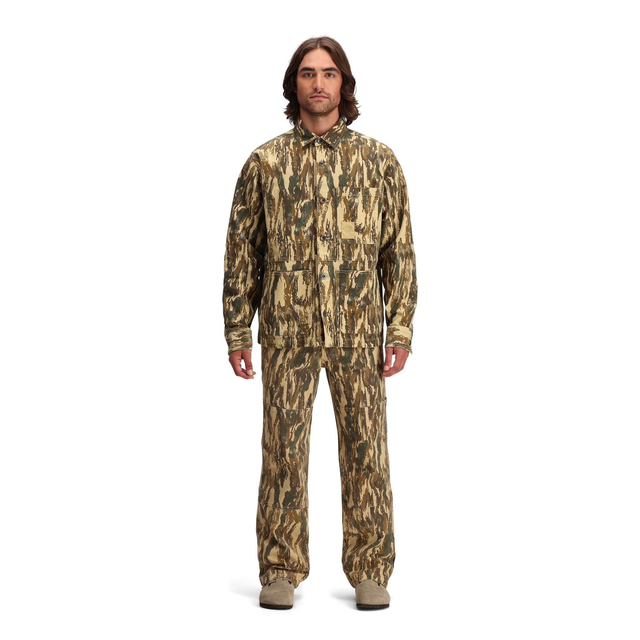 General front model shot of Topo Designs Dirt Utility Jacket - Men's  in "Dirt Camo Print"