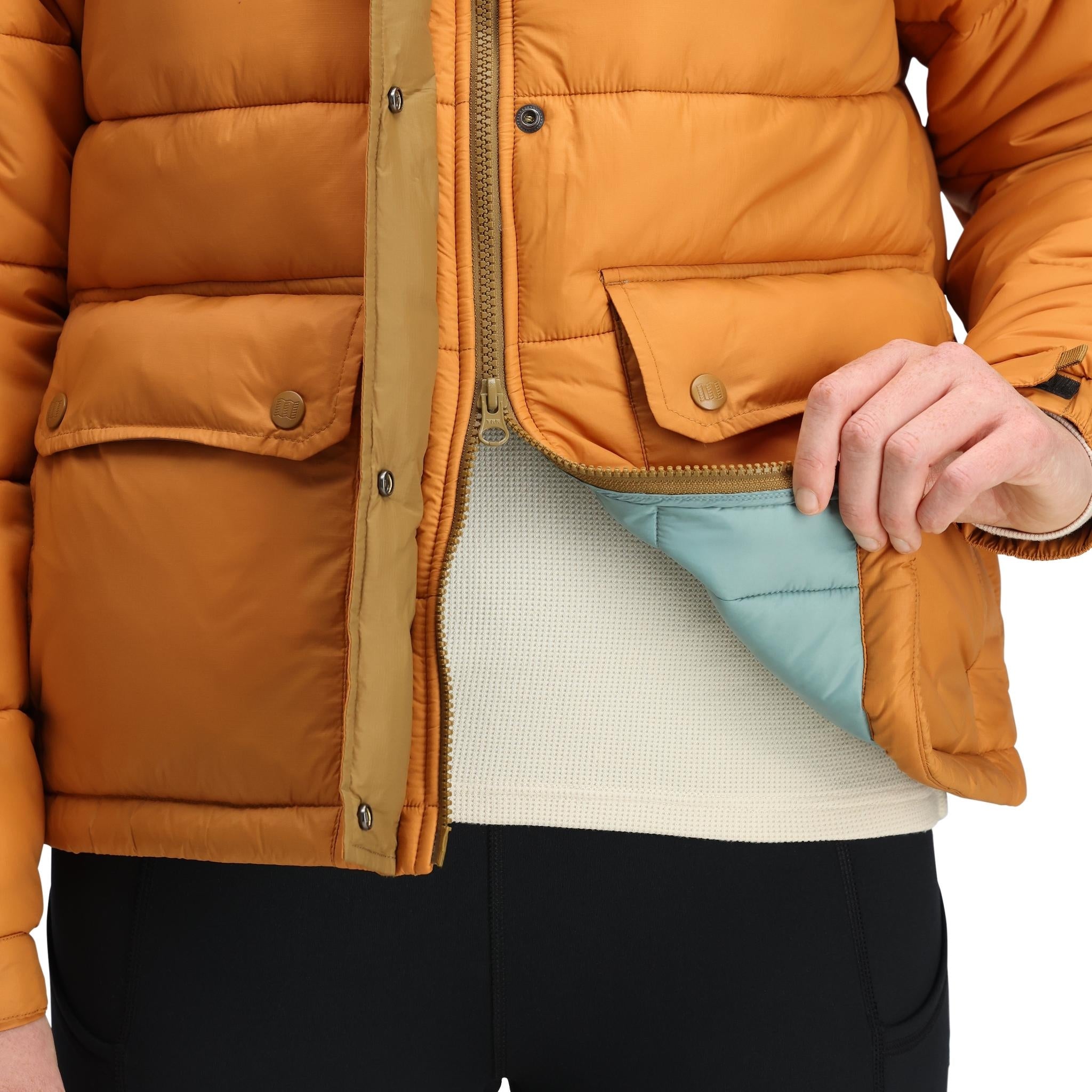 Detail shot of Topo Designs Retro Ridge Puffer Jacket - Women's  in "Dark Khaki / Spice"