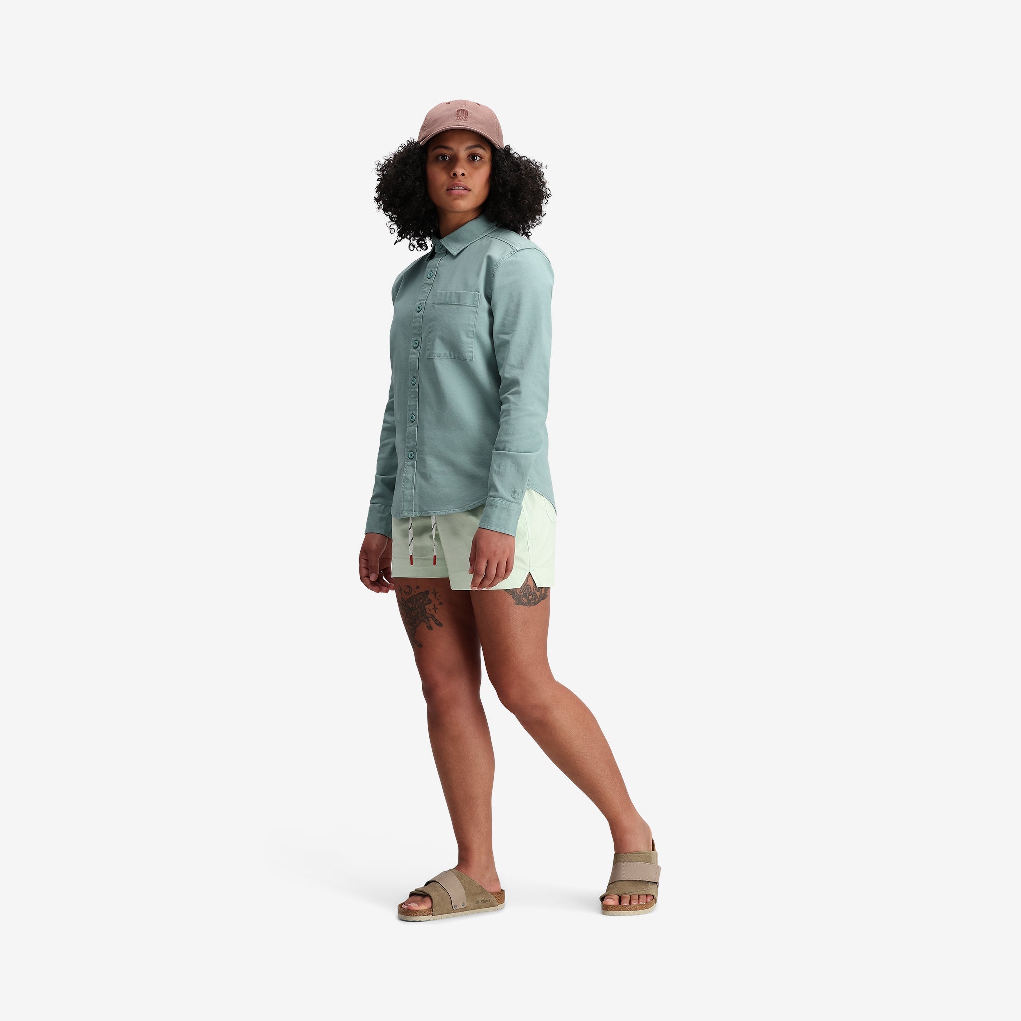 General model shot of Topo Designs Women's Dirt Shorts in "Light Mint".