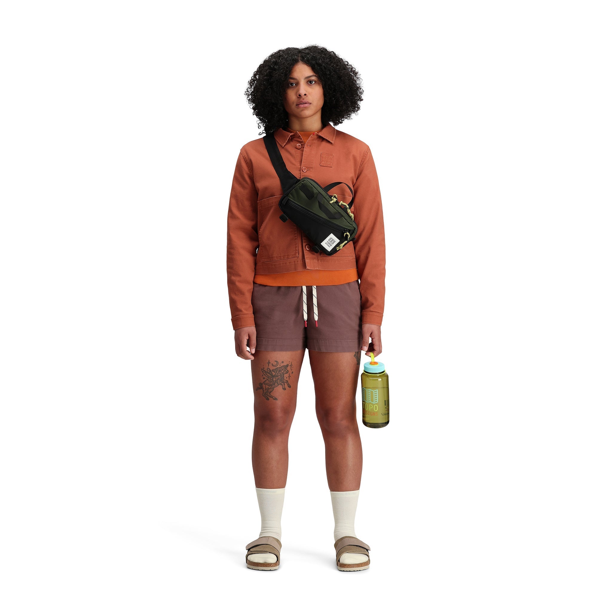 Model shot of Topo Designs Women's Dirt Shorts in "Peppercorn".