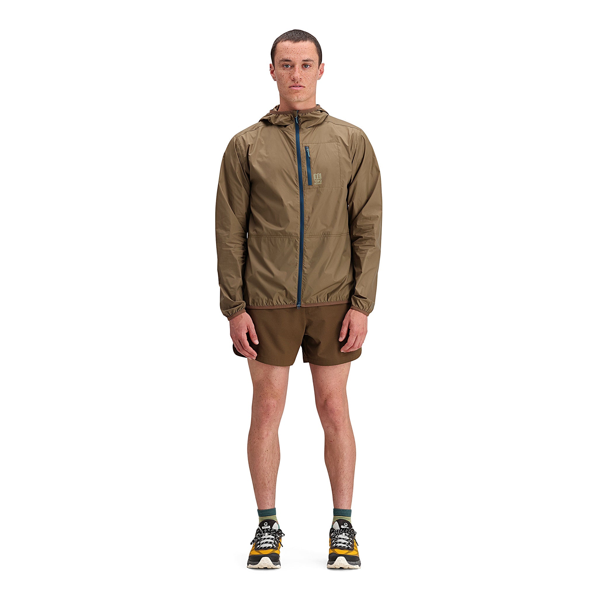 General front model shot of Topo Designs Global Trek Shorts 7" - Men's in "Desert Palm"