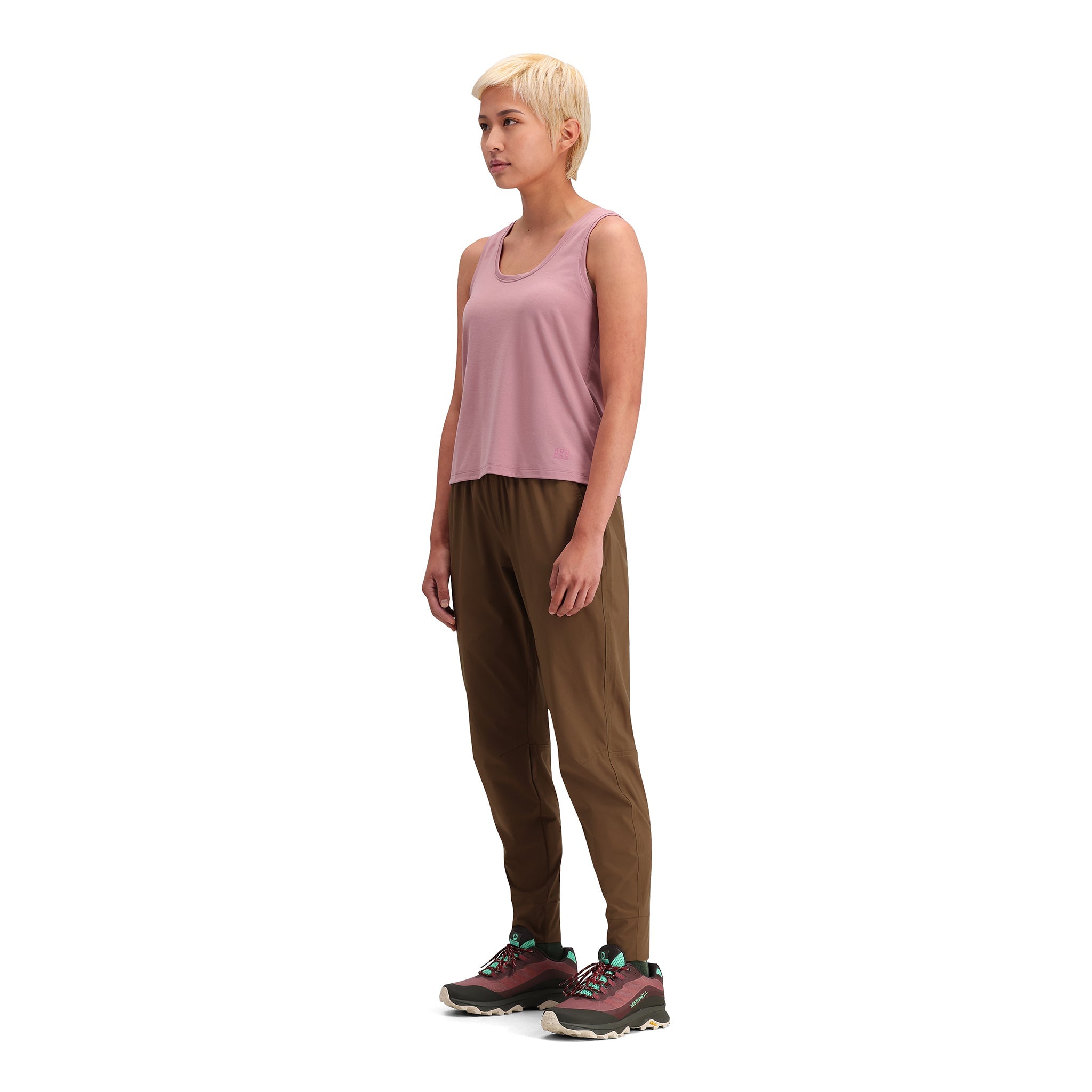 General side model shot of Topo Designs Global Jogger - Women's in "Desert Palm"