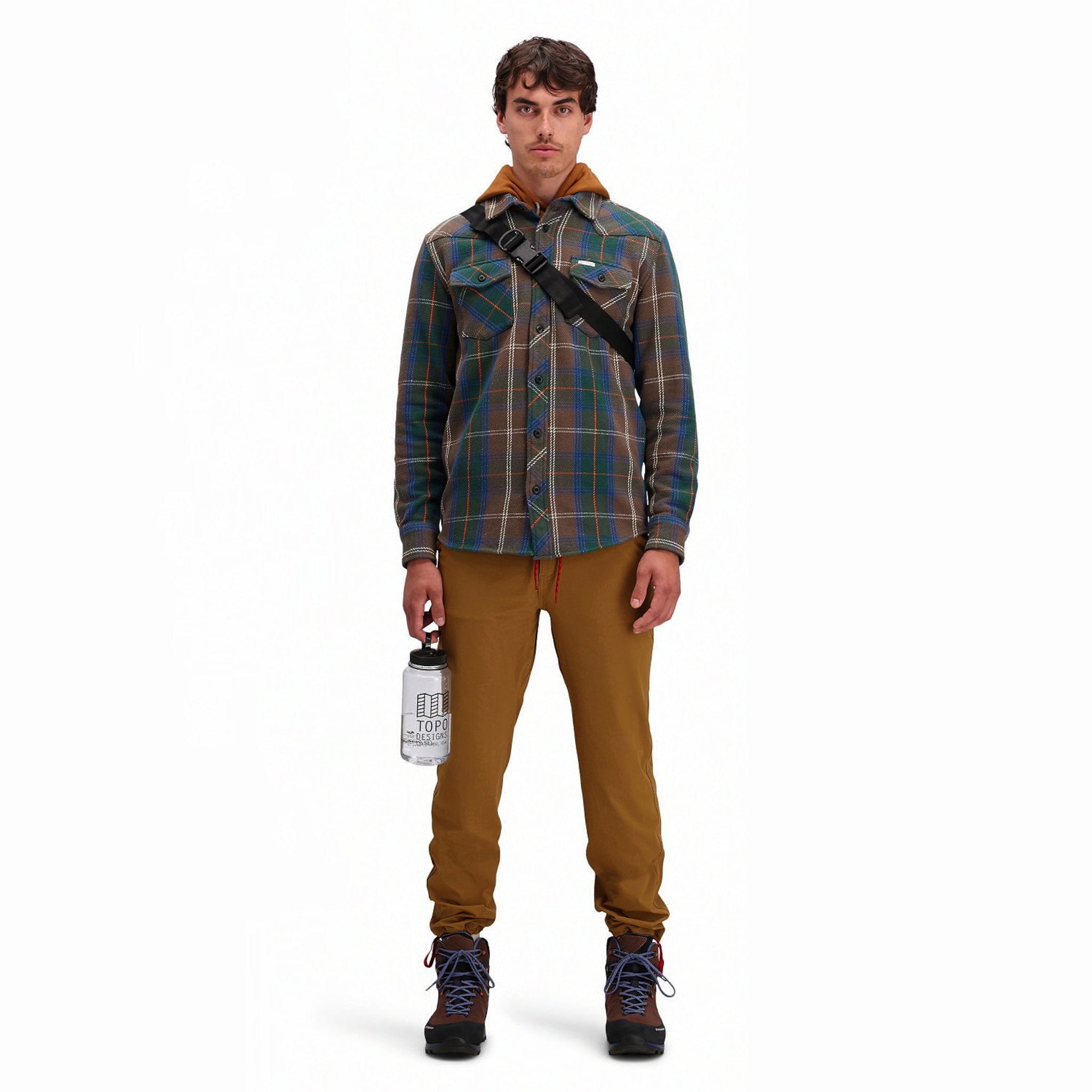 Front model shot of Topo Designs Men's Boulder lightweight climbing & hiking pants in "dark khaki" brown. 