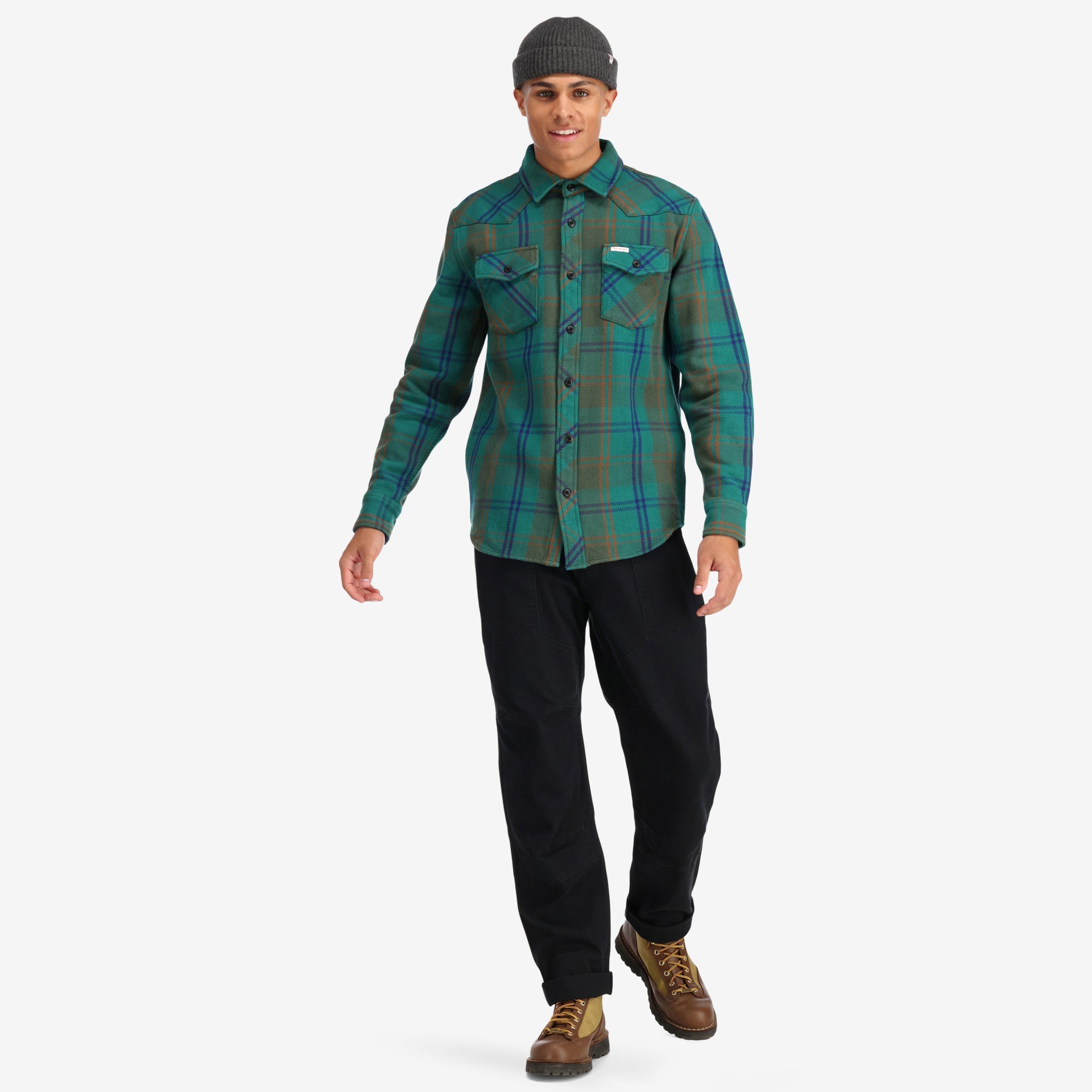 Front model shot of Topo Designs Men's Mountain Shirt Heavyweight "Green / Earth Plaid" brown blue button-up.