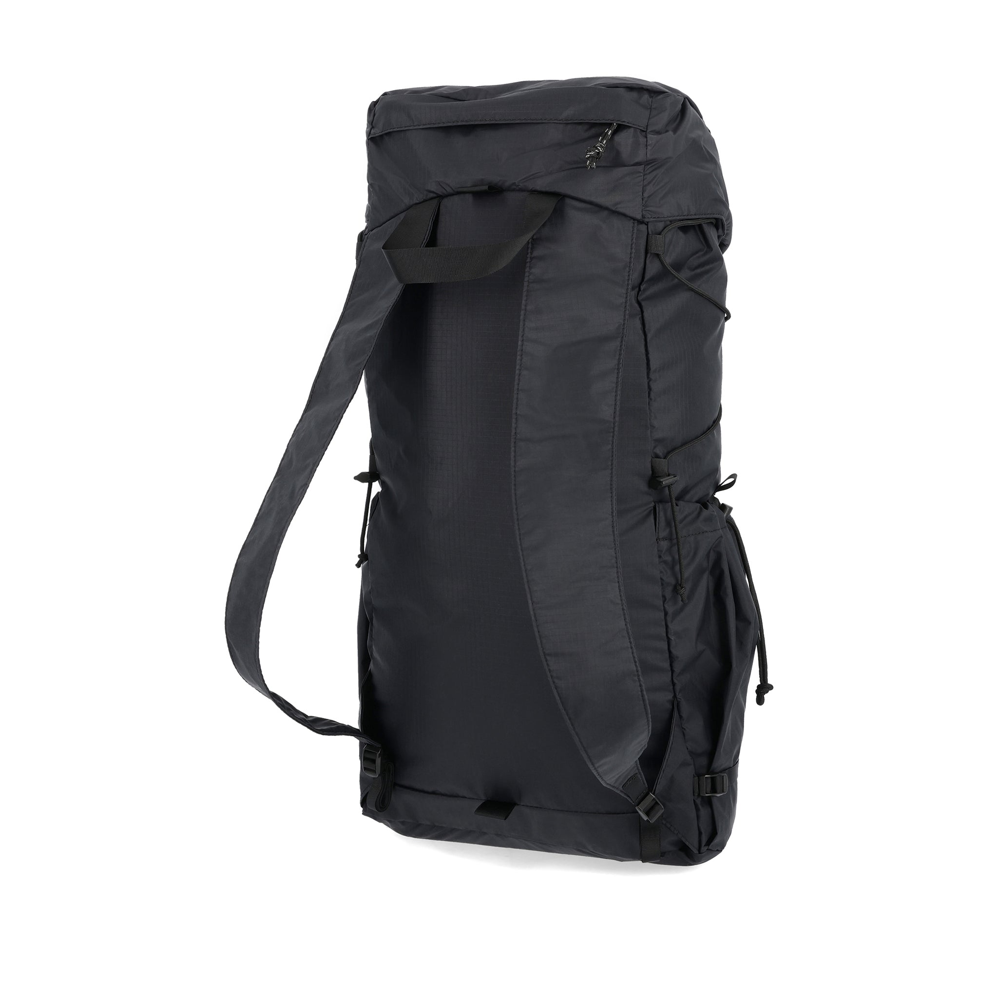 Back of Topo Designs TopoLite Cinch Pack 16L packable daypack backpack for travel in "black"