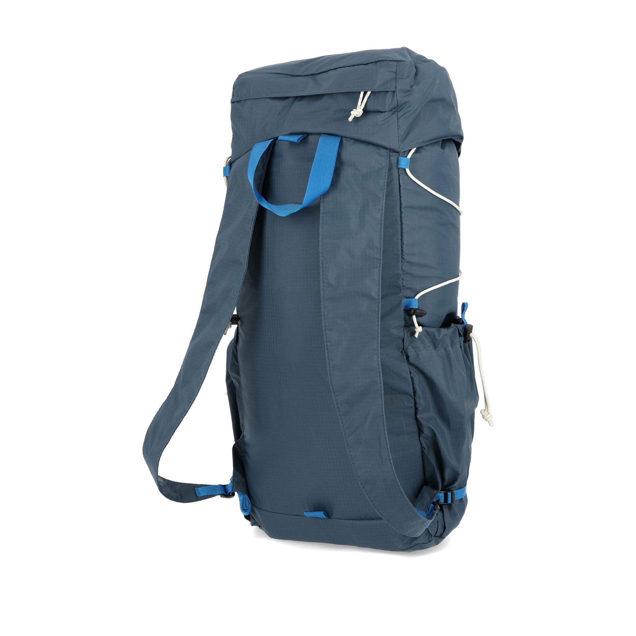 Back of Topo Designs TopoLite Cinch Pack 16L packable daypack backpack for travel in "pond blue"