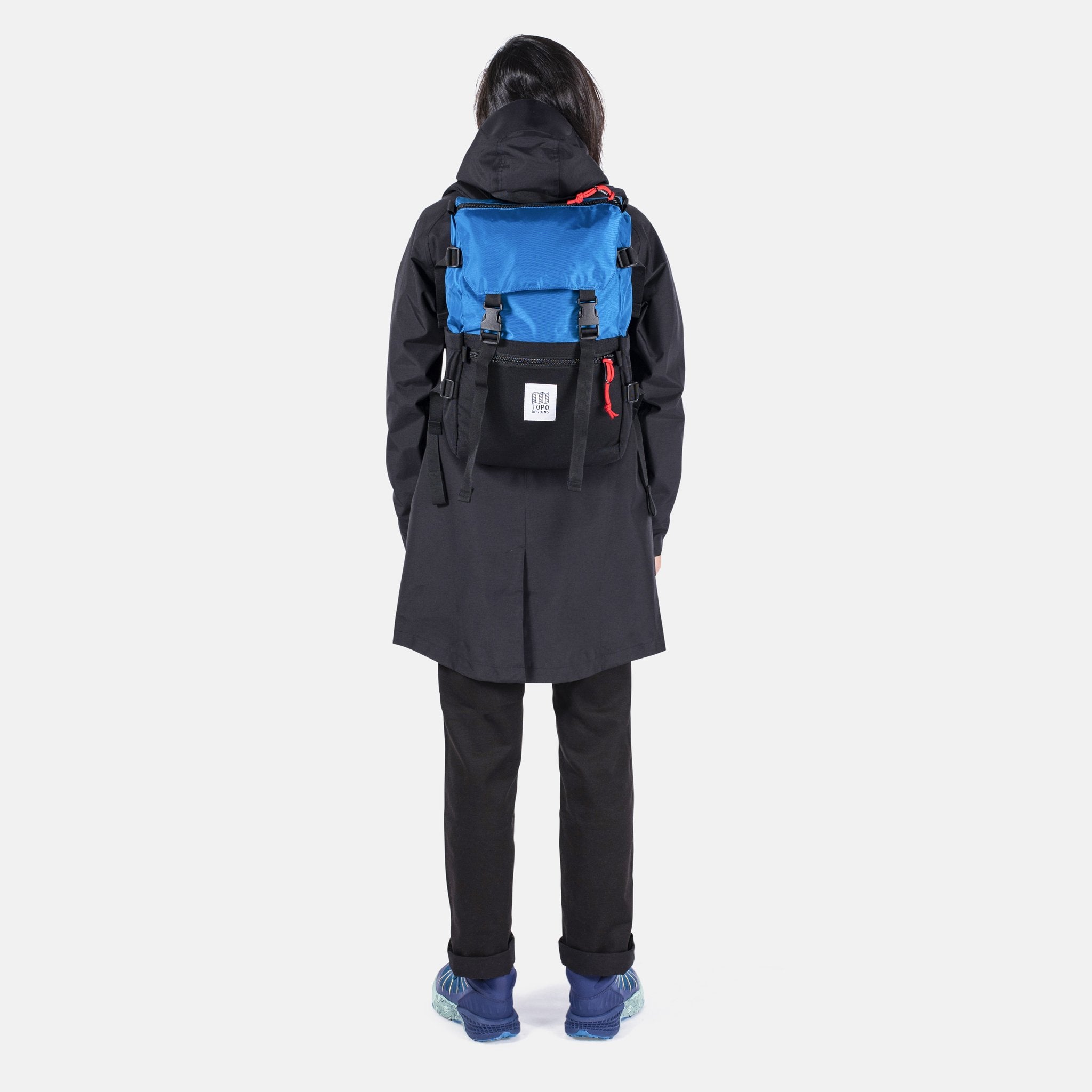 Back Model Shot of the Topo Designs Rover Pack Classic in Blue/Black