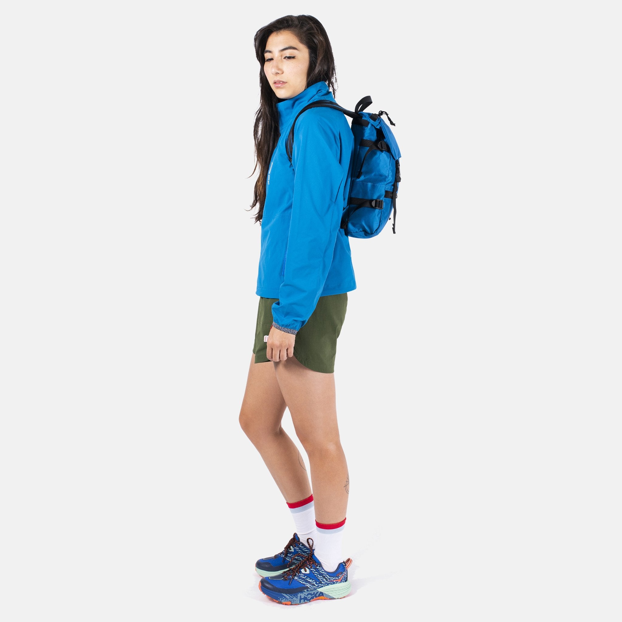 Side Model Shot of the Topo Designs Rover Pack Mini in Blue