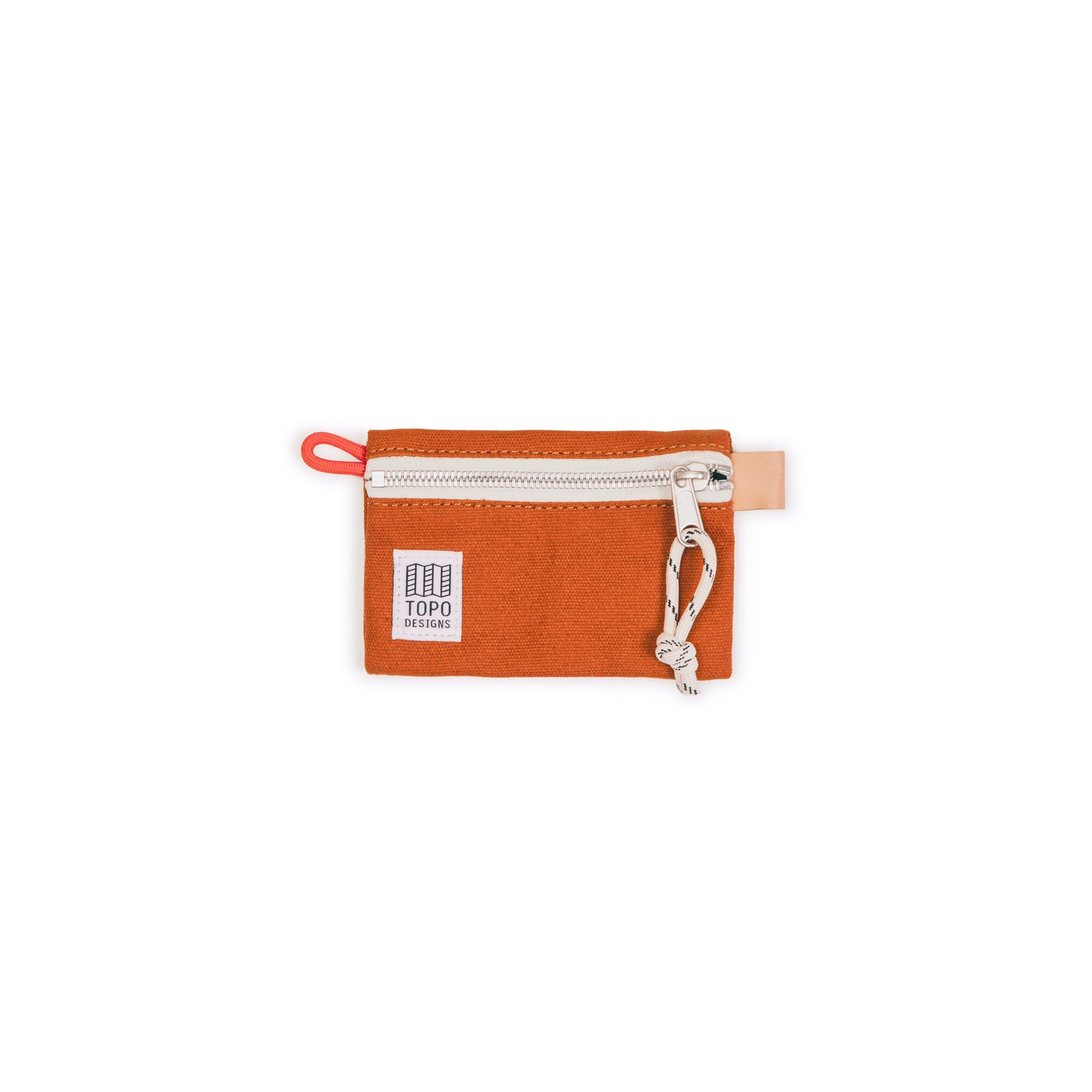 Topo Designs Accessory Bag Micro in clay orange canvas.