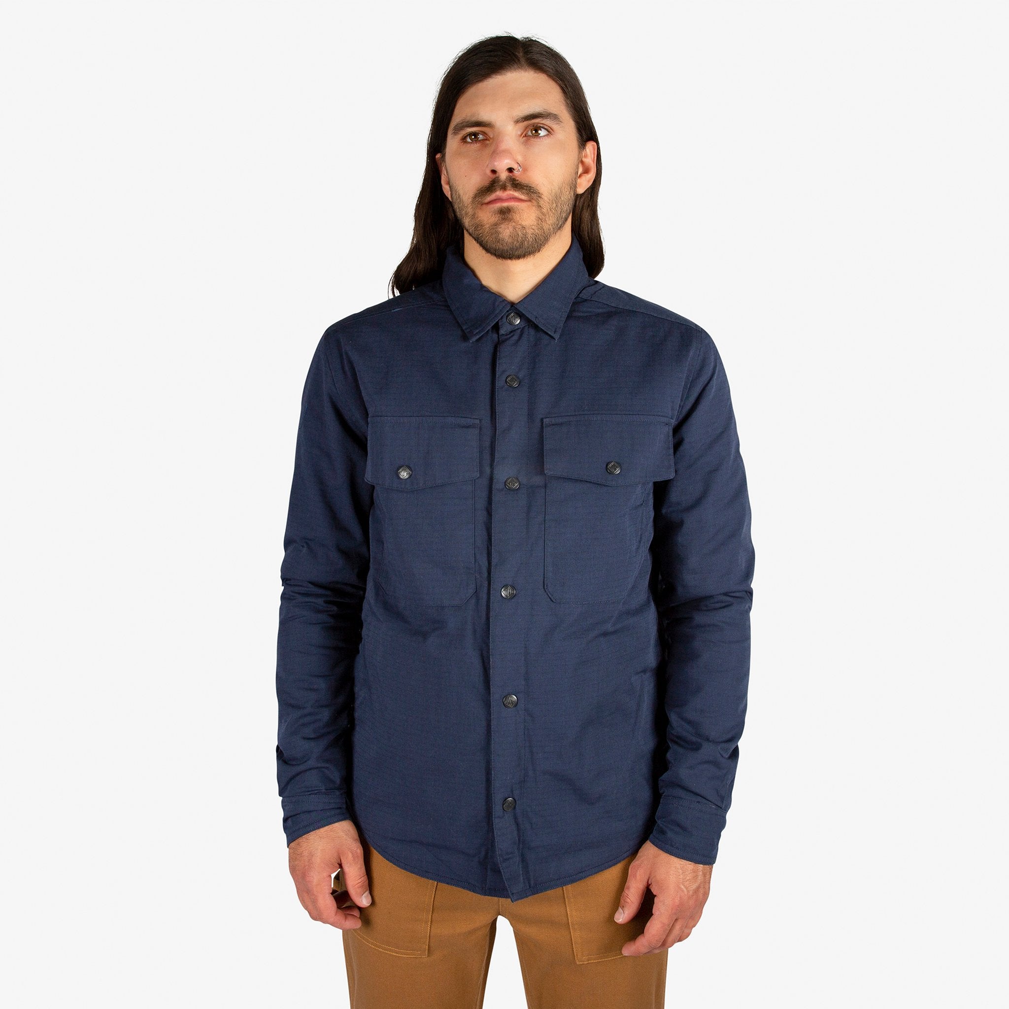 General close-up front model shot of Men's Topo Designs Insulated Shirt Jacket in Navy blue.