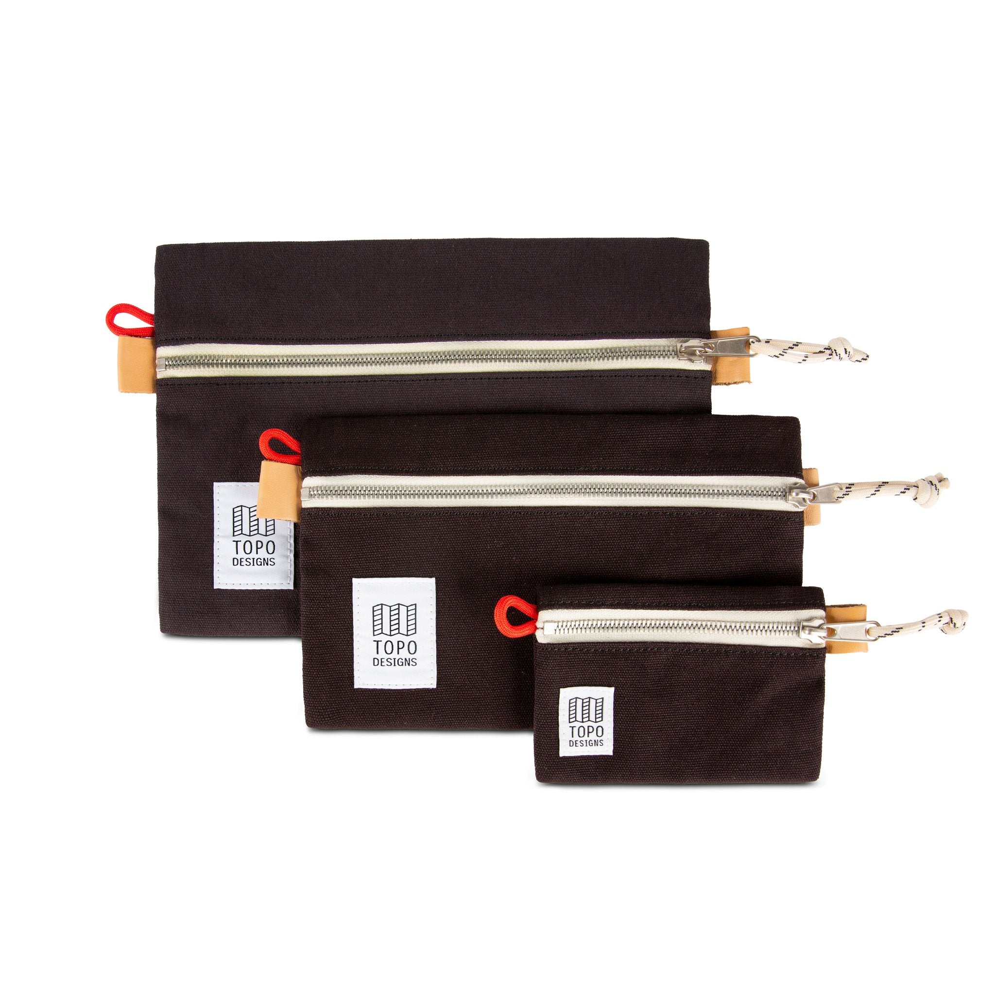 Collection of 3 sizes of Topo Designs Accessory Bags in Black canvas.